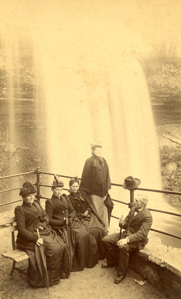 These solid citizens commemorated their pleasant dat at Minnehaha Park with a photograph.