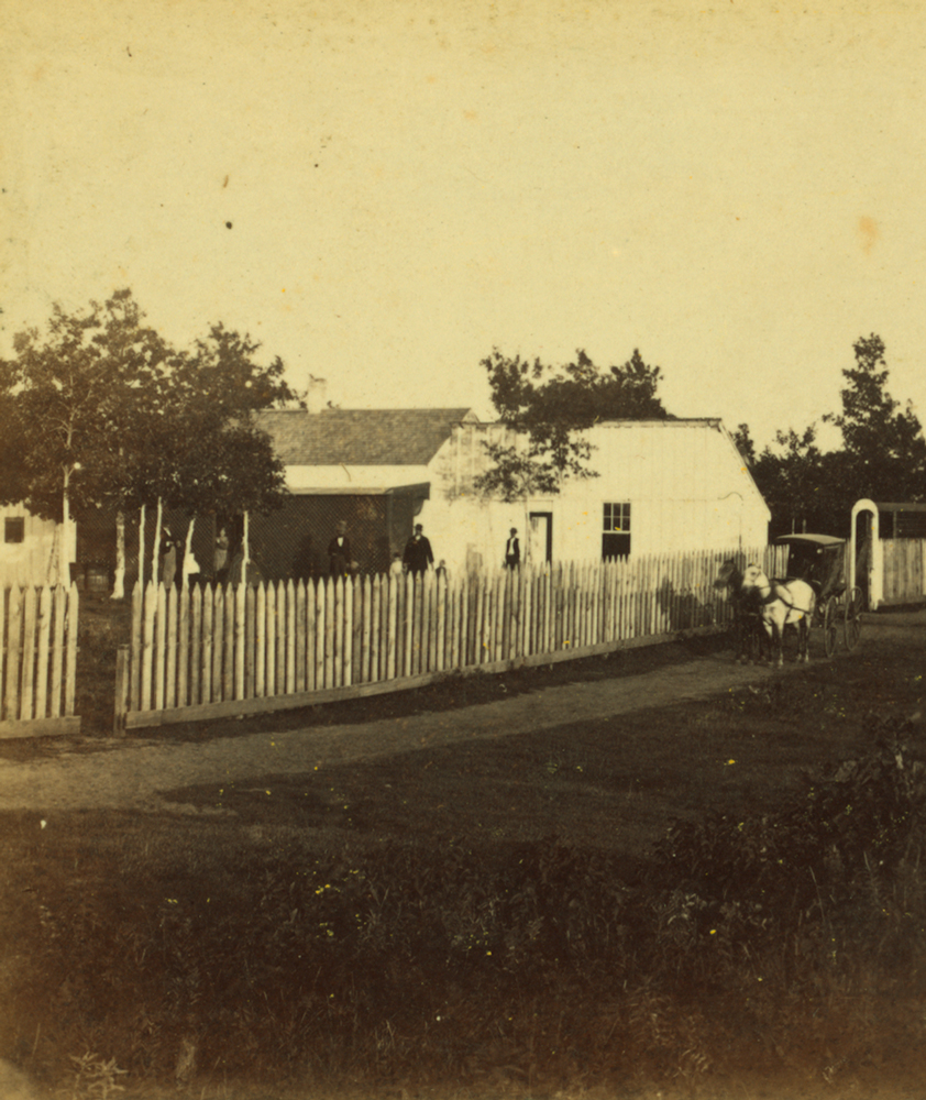 In 1863, this hotel sat on the south bank of the creek above the Falls.