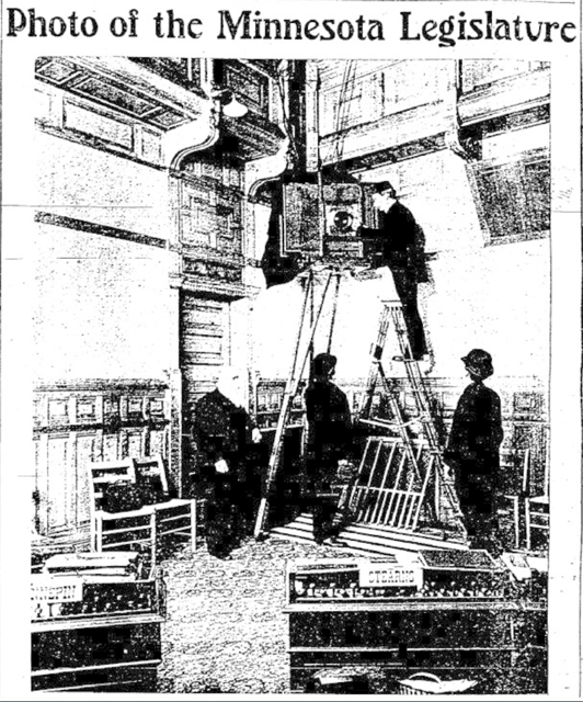 a seemingly yard-long camera is being installed in the corner of a room. It is played in a ladder.