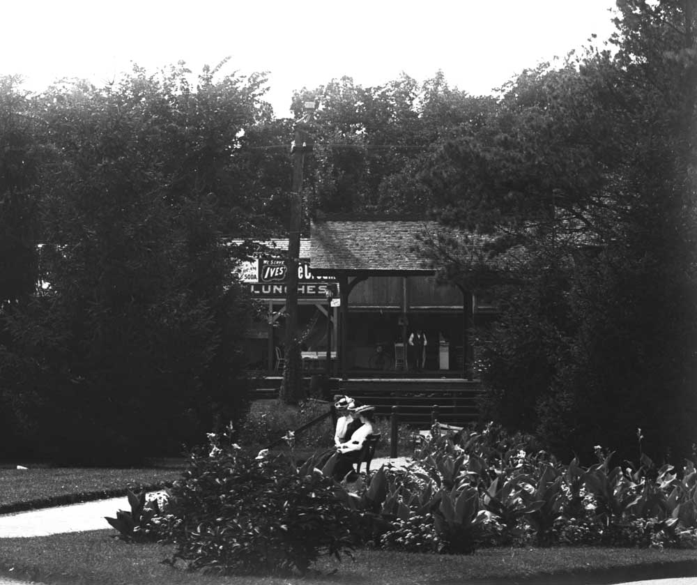 the old train depot at Minnehaha Falls, and some buildings behind it