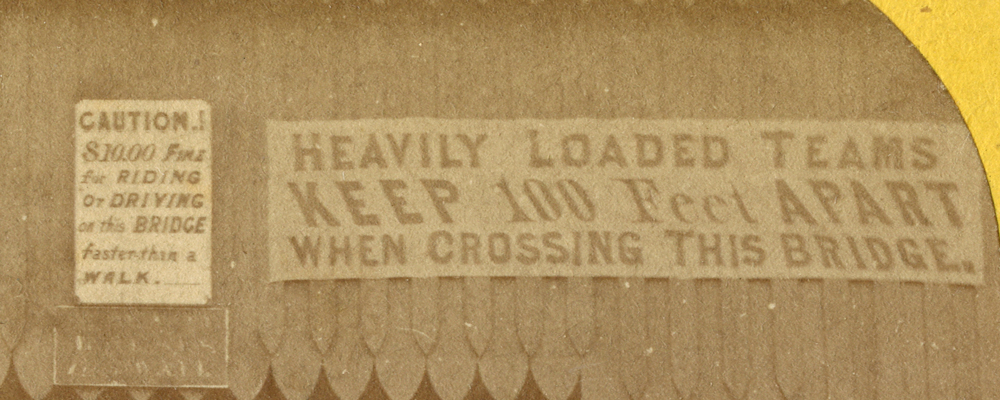 A sign on the first bridge across the Mississippi, warning that heavy teams cross with 100 feet of distance between them.